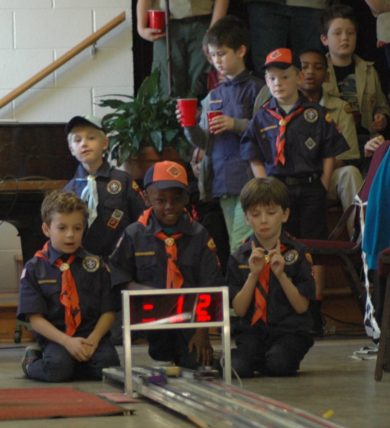 Cub Scouts watching the pinewood derby
